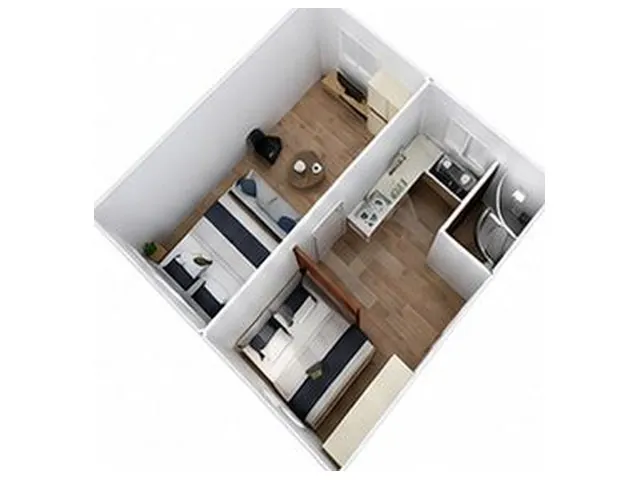Plan volumétrique d'un studio à deux lits avec kitchenette et buanderie